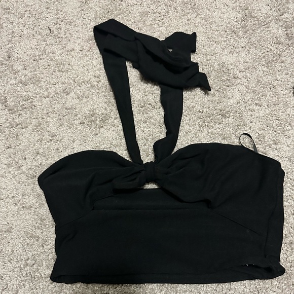 Size small, black crop top with a tie around neck. - Picture 2 of 2